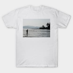Boy walking through water in low tide T-Shirt
